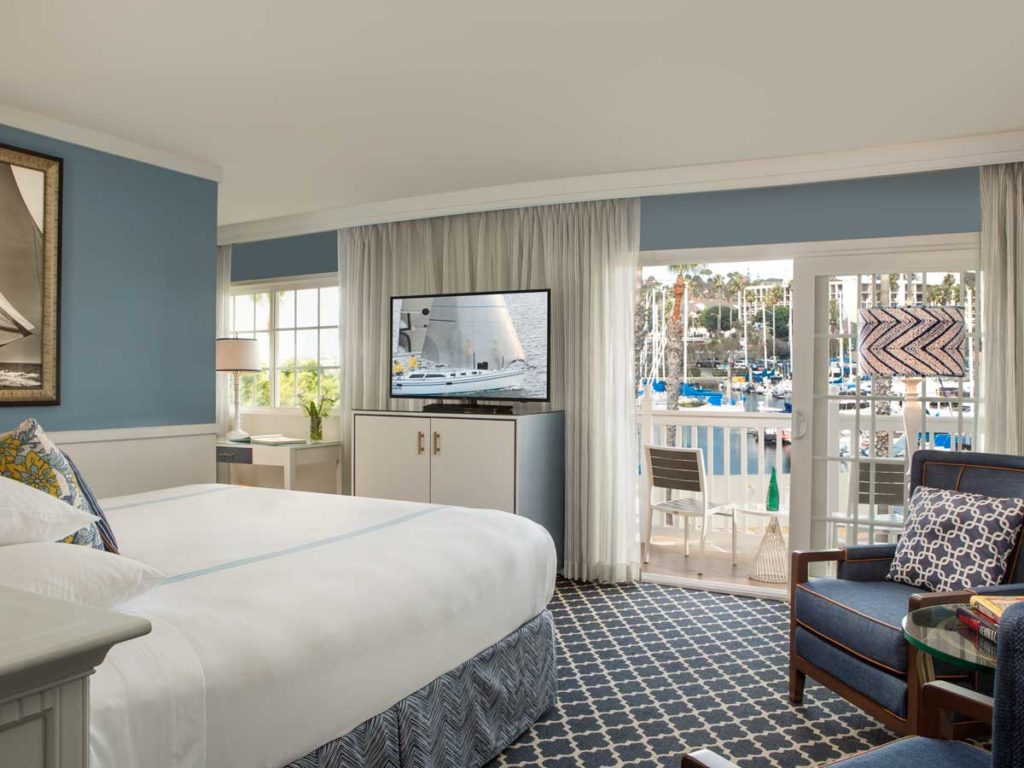 Guestroom with king size bed and marina view