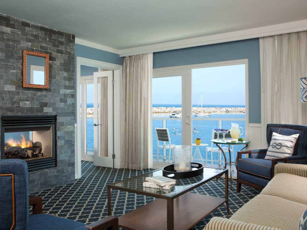 Guestroom suite with balcony and view of ocean