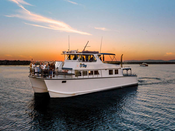 Catamaran Boat At Sunset