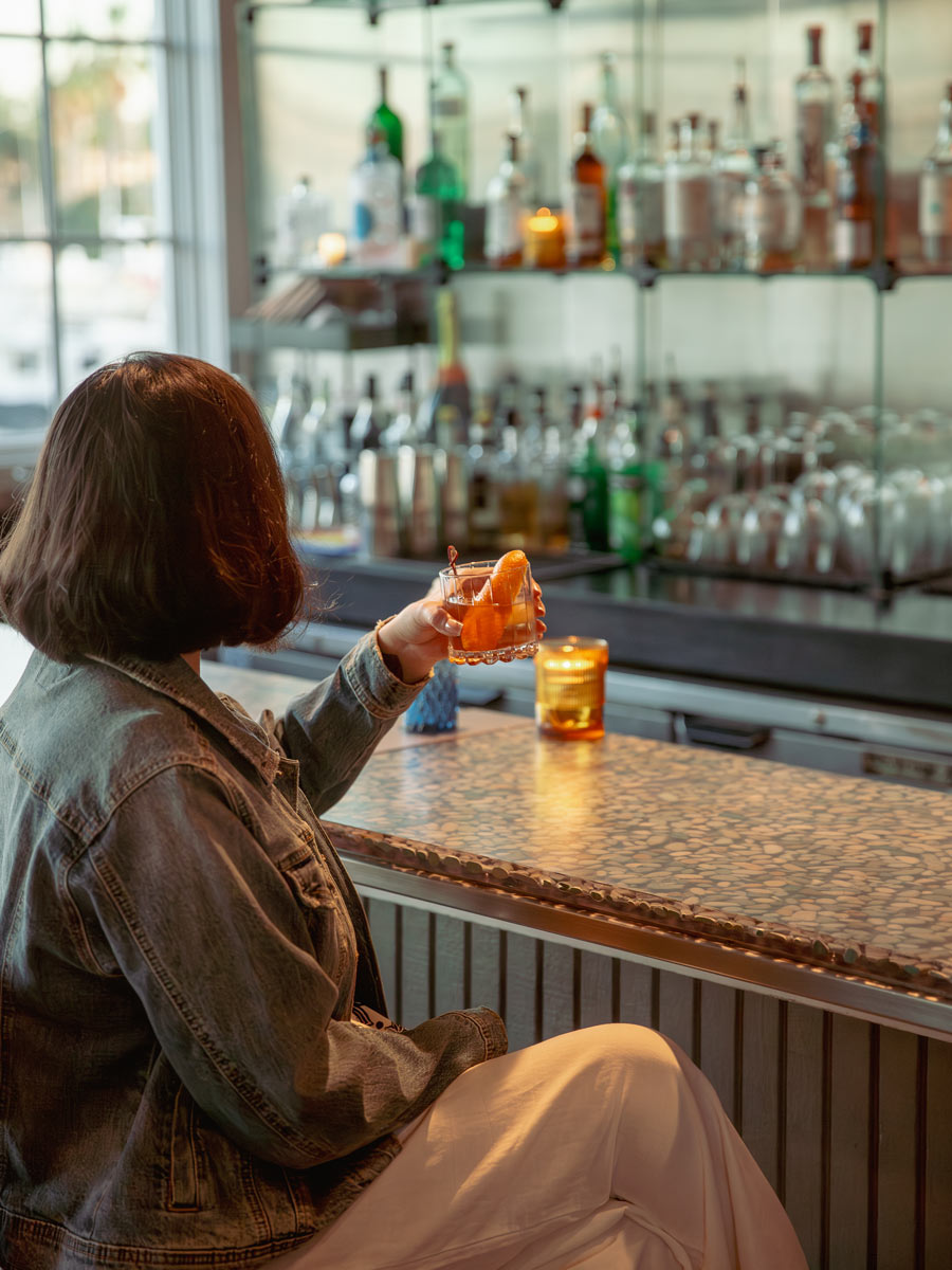Lady With A Cocktail At The Bar