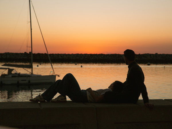 Couple Watching The Sunset